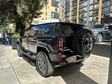 Cargar imagen en el visor de la galería, GMC Hummer EV SUV Blindada Modelo 2025
